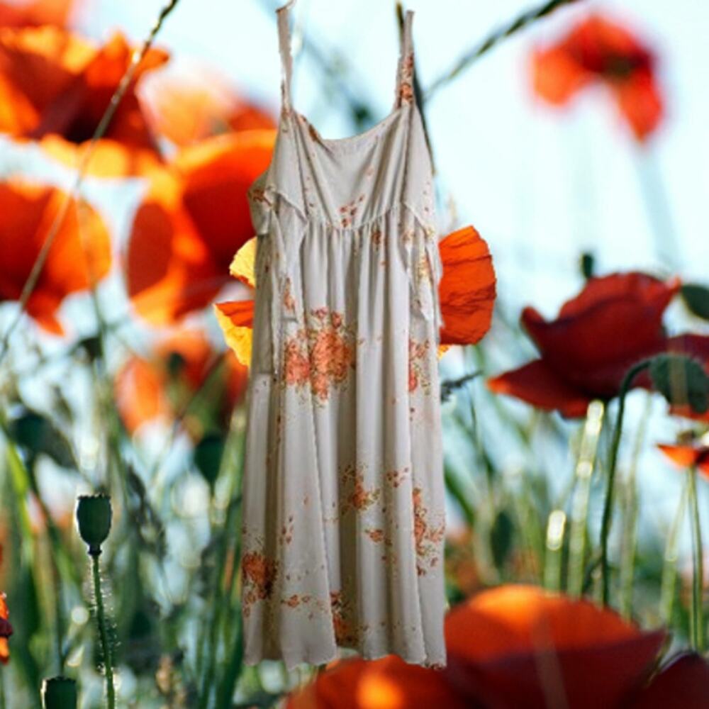 Free People small cold shoulder tie sleeves flowy floral lined woman's dress.
